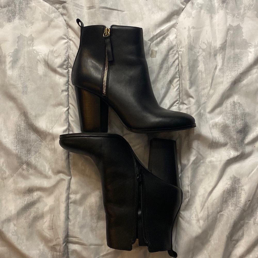 black leather ankle boot, with a round toe and block heal